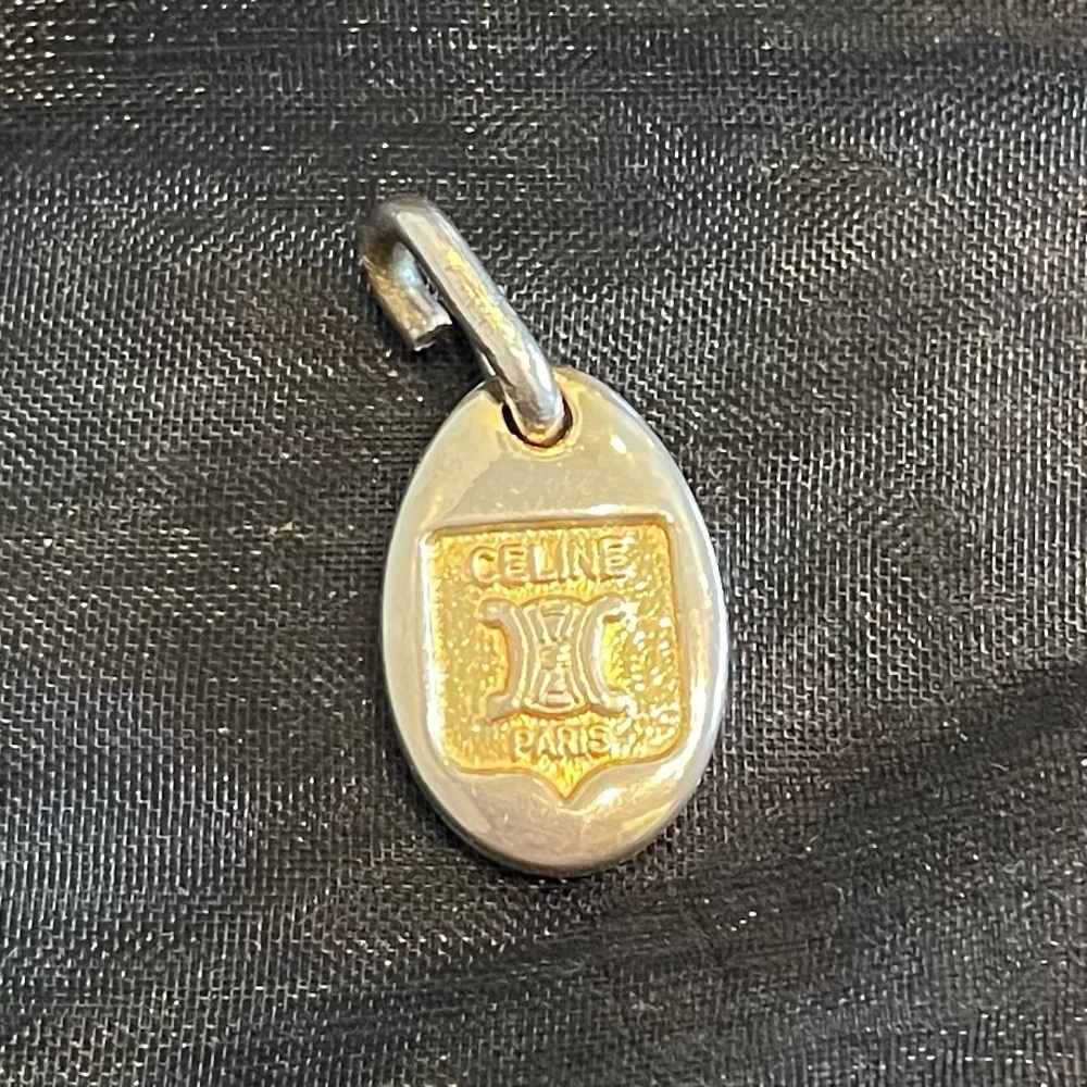 Celine Paris Pendant with Gold Tones